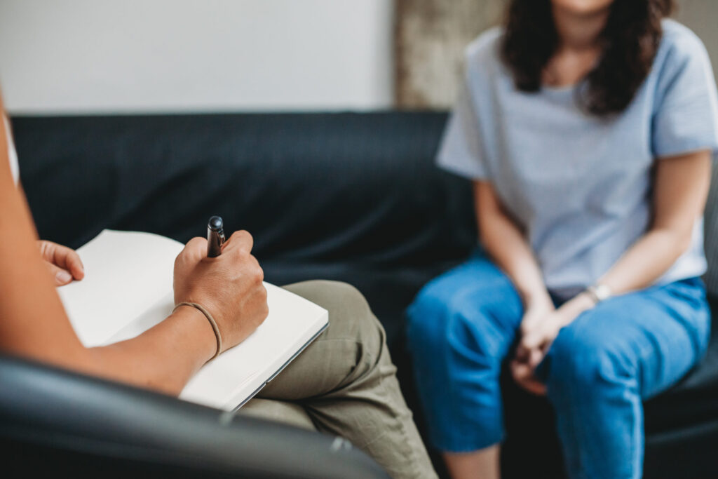 psychotherapy session, woman talking to his psychologist in the studio